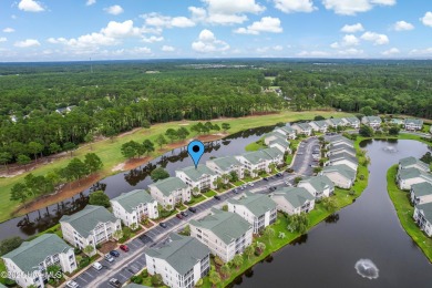 Don't Miss This First Floor - Golf  Pond View Condo in Sandpiper on Sandpiper Bay Golf and Country Club in North Carolina - for sale on GolfHomes.com, golf home, golf lot