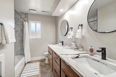 An amazing contemporary split-level home near Arroyo Del Oso on Arroyo Del Oso Golf Course in New Mexico - for sale on GolfHomes.com, golf home, golf lot