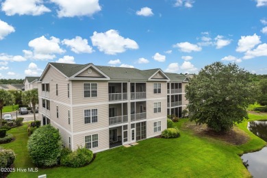 Don't Miss This First Floor - Golf  Pond View Condo in Sandpiper on Sandpiper Bay Golf and Country Club in North Carolina - for sale on GolfHomes.com, golf home, golf lot