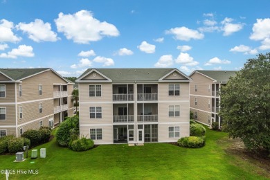 Don't Miss This First Floor - Golf  Pond View Condo in Sandpiper on Sandpiper Bay Golf and Country Club in North Carolina - for sale on GolfHomes.com, golf home, golf lot