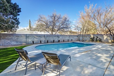 An amazing contemporary split-level home near Arroyo Del Oso on Arroyo Del Oso Golf Course in New Mexico - for sale on GolfHomes.com, golf home, golf lot