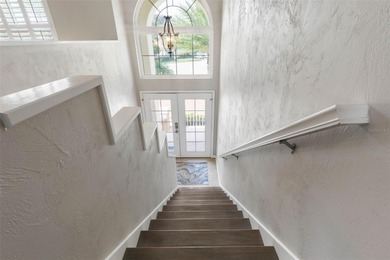 Welcome to refined coastal living in this beautifully renovated on Hammock Dunes Club in Florida - for sale on GolfHomes.com, golf home, golf lot