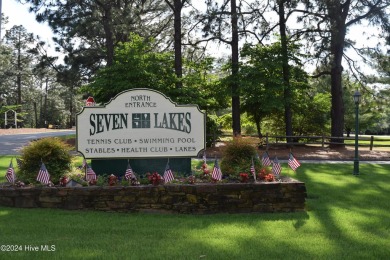 Great opportunity to own a single level ranch home in gated on Seven Lakes Country Club in North Carolina - for sale on GolfHomes.com, golf home, golf lot