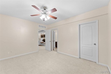 This gorgeous custom-built atrium ranch masterpiece backs to the on Bear Creek Golf Club in Missouri - for sale on GolfHomes.com, golf home, golf lot
