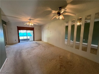 First-floor 2-bedroom, 2-bath condo located in the welcoming 55+ on Golden Gate Country Club in Florida - for sale on GolfHomes.com, golf home, golf lot