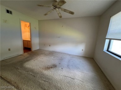 First-floor 2-bedroom, 2-bath condo located in the welcoming 55+ on Golden Gate Country Club in Florida - for sale on GolfHomes.com, golf home, golf lot