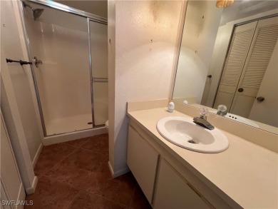 First-floor 2-bedroom, 2-bath condo located in the welcoming 55+ on Golden Gate Country Club in Florida - for sale on GolfHomes.com, golf home, golf lot