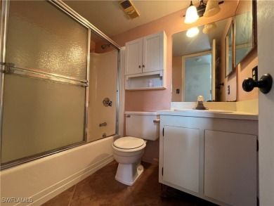First-floor 2-bedroom, 2-bath condo located in the welcoming 55+ on Golden Gate Country Club in Florida - for sale on GolfHomes.com, golf home, golf lot