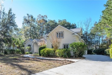 Enjoy the incredible sunset views of a large lagoon and bird on Callawassie Island Club in South Carolina - for sale on GolfHomes.com, golf home, golf lot