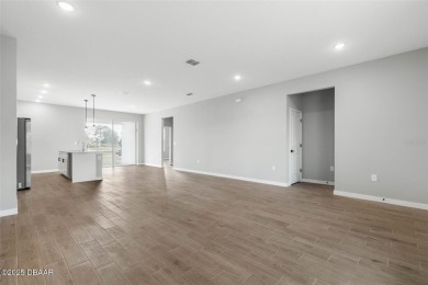 One or more photo(s) has been virtually staged. Walk to PINE on The Grand Club - Pine Lakes Course in Florida - for sale on GolfHomes.com, golf home, golf lot