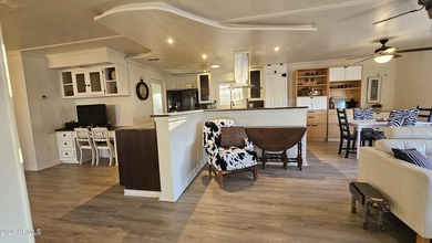 Welcome to this beautifully maintained home that blends COMFORT on Sun Lakes Country Club in Arizona - for sale on GolfHomes.com, golf home, golf lot