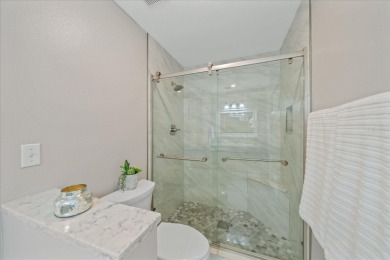 This beautifully maintained 2-bedroom, 2-bath condo offers on Peridia Golf and Country Club in Florida - for sale on GolfHomes.com, golf home, golf lot