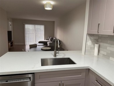 Beautifully renovated condo located in the desirable gated on Sunrise Lakes Phase IV Golf Course in Florida - for sale on GolfHomes.com, golf home, golf lot