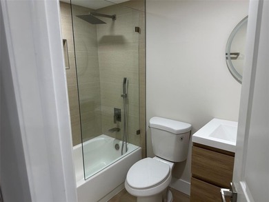 Beautifully renovated condo located in the desirable gated on Sunrise Lakes Phase IV Golf Course in Florida - for sale on GolfHomes.com, golf home, golf lot