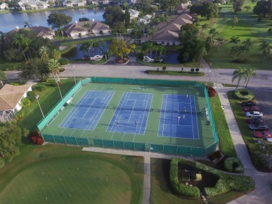 This beautifully maintained 2-bedroom, 2-bath condo offers on Peridia Golf and Country Club in Florida - for sale on GolfHomes.com, golf home, golf lot