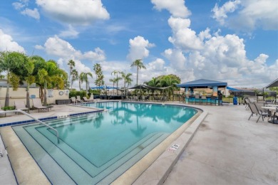 This beautifully maintained 2-bedroom, 2-bath condo offers on Peridia Golf and Country Club in Florida - for sale on GolfHomes.com, golf home, golf lot