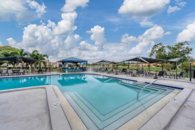 This beautifully maintained 2-bedroom, 2-bath condo offers on Peridia Golf and Country Club in Florida - for sale on GolfHomes.com, golf home, golf lot