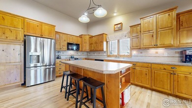 Nestled in the coveted Highland Meadows Golf Course community on Highland Meadows Golf Course in Colorado - for sale on GolfHomes.com, golf home, golf lot