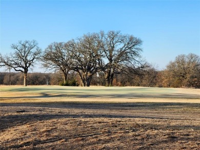 Golfers dream this beautiful build site over looking holes 1 and on Nocona Hills Golf Course in Texas - for sale on GolfHomes.com, golf home, golf lot