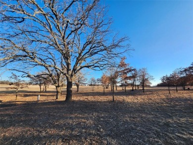 Golfers dream this beautiful build site over looking holes 1 and on Nocona Hills Golf Course in Texas - for sale on GolfHomes.com, golf home, golf lot