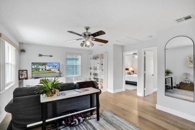 Spacious and beautifully updated 2-story home located in a on Palm-Aire Country Club and Resort - The Oaks in Florida - for sale on GolfHomes.com, golf home, golf lot