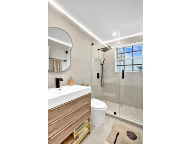 Spacious and beautifully updated 2-story home located in a on Palm-Aire Country Club and Resort - The Oaks in Florida - for sale on GolfHomes.com, golf home, golf lot