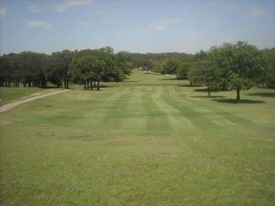 Golfers dream this beautiful build site over looking holes 1 and on Nocona Hills Golf Course in Texas - for sale on GolfHomes.com, golf home, golf lot