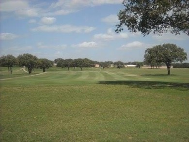 Golfers dream this beautiful build site over looking holes 1 and on Nocona Hills Golf Course in Texas - for sale on GolfHomes.com, golf home, golf lot