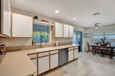 Spacious and beautifully updated 2-story home located in a on Palm-Aire Country Club and Resort - The Oaks in Florida - for sale on GolfHomes.com, golf home, golf lot