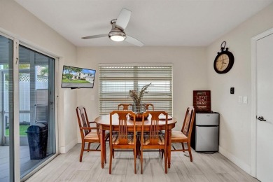 Spacious and beautifully updated 2-story home located in a on Palm-Aire Country Club and Resort - The Oaks in Florida - for sale on GolfHomes.com, golf home, golf lot