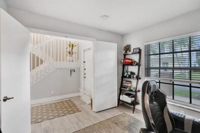 Spacious and beautifully updated 2-story home located in a on Palm-Aire Country Club and Resort - The Oaks in Florida - for sale on GolfHomes.com, golf home, golf lot