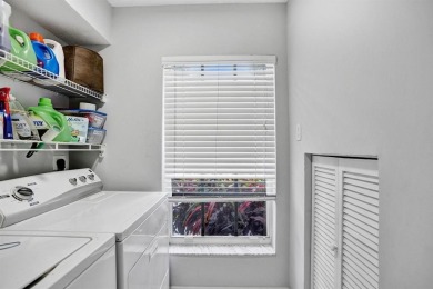 Spacious and beautifully updated 2-story home located in a on Palm-Aire Country Club and Resort - The Oaks in Florida - for sale on GolfHomes.com, golf home, golf lot