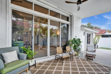 Spacious and beautifully updated 2-story home located in a on Palm-Aire Country Club and Resort - The Oaks in Florida - for sale on GolfHomes.com, golf home, golf lot