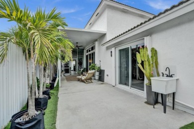 Spacious and beautifully updated 2-story home located in a on Palm-Aire Country Club and Resort - The Oaks in Florida - for sale on GolfHomes.com, golf home, golf lot