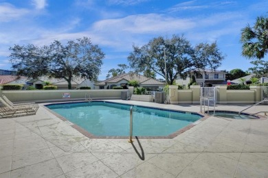 Spacious and beautifully updated 2-story home located in a on Palm-Aire Country Club and Resort - The Oaks in Florida - for sale on GolfHomes.com, golf home, golf lot