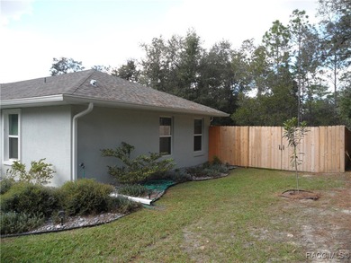 This beautiful 2023 built 3/2/2 home comes fully furnished and on Citrus Hills Golf Club in Florida - for sale on GolfHomes.com, golf home, golf lot