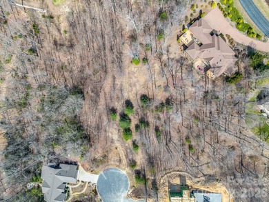 Discover the perfect setting for your dream home on this on Cummings Cove Golf and Country Club in North Carolina - for sale on GolfHomes.com, golf home, golf lot