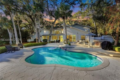 Nestled in Palmetto Dunes, this stunning 5-bedroom, 4.5-bath on Palmetto Dunes Golf Course and Resort in South Carolina - for sale on GolfHomes.com, golf home, golf lot