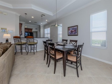 This stunning WCI-built  home offers a picturesque view from on Venetian Golf and River Club in Florida - for sale on GolfHomes.com, golf home, golf lot