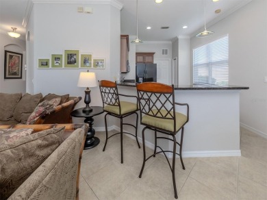 This stunning WCI-built  home offers a picturesque view from on Venetian Golf and River Club in Florida - for sale on GolfHomes.com, golf home, golf lot