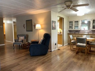 LOVELY DOUBLE-WIDE!  LARGE FRONT LANAI!  TURNKEY! FURNISHED on Wedgewood Golf Club in Florida - for sale on GolfHomes.com, golf home, golf lot