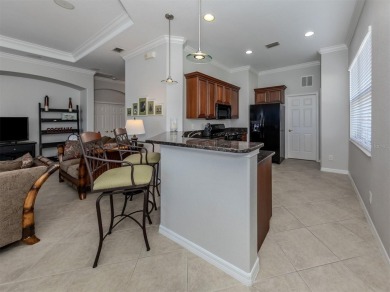 This stunning WCI-built  home offers a picturesque view from on Venetian Golf and River Club in Florida - for sale on GolfHomes.com, golf home, golf lot