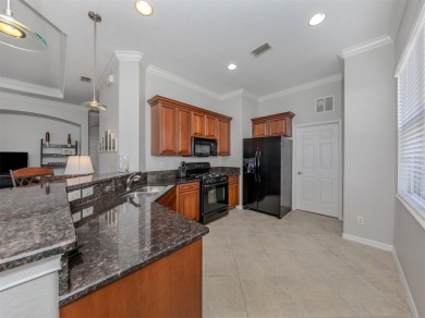 This stunning WCI-built  home offers a picturesque view from on Venetian Golf and River Club in Florida - for sale on GolfHomes.com, golf home, golf lot