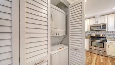 Must-see beautifully furnished villa, updated, end unit and a on The Meadows Golf and Country Club in Florida - for sale on GolfHomes.com, golf home, golf lot