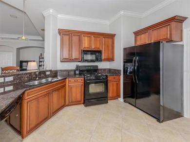 This stunning WCI-built  home offers a picturesque view from on Venetian Golf and River Club in Florida - for sale on GolfHomes.com, golf home, golf lot