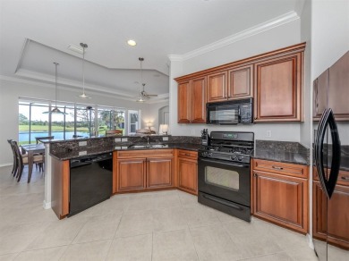 This stunning WCI-built  home offers a picturesque view from on Venetian Golf and River Club in Florida - for sale on GolfHomes.com, golf home, golf lot