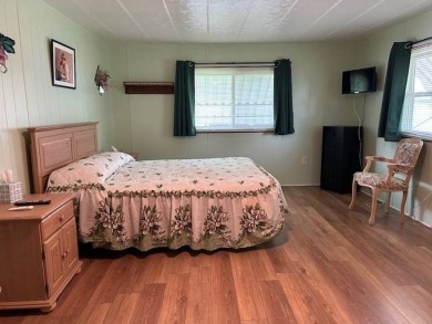 LOVELY DOUBLE-WIDE!  LARGE FRONT LANAI!  TURNKEY! FURNISHED on Wedgewood Golf Club in Florida - for sale on GolfHomes.com, golf home, golf lot