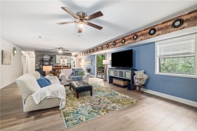 Don't miss this beautifully remodeled 4-bedroom, 3-bath home on Bella Vista Country Club - Berksdale in Arkansas - for sale on GolfHomes.com, golf home, golf lot