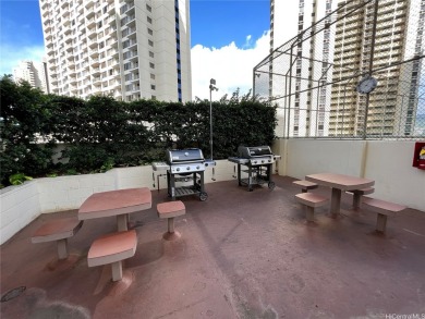 Perched on the 26th floor of the esteemed Waipuna condominium in on Ala Wai Golf Course in Hawaii - for sale on GolfHomes.com, golf home, golf lot