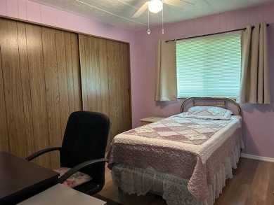 LOVELY DOUBLE-WIDE!  LARGE FRONT LANAI!  TURNKEY! FURNISHED on Wedgewood Golf Club in Florida - for sale on GolfHomes.com, golf home, golf lot